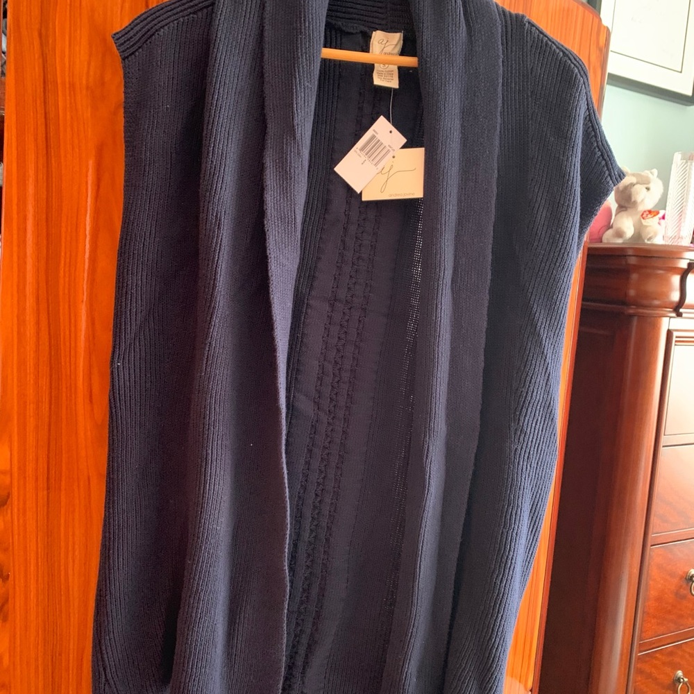 Ladies sweater,sleeveless.  cotton...brand new